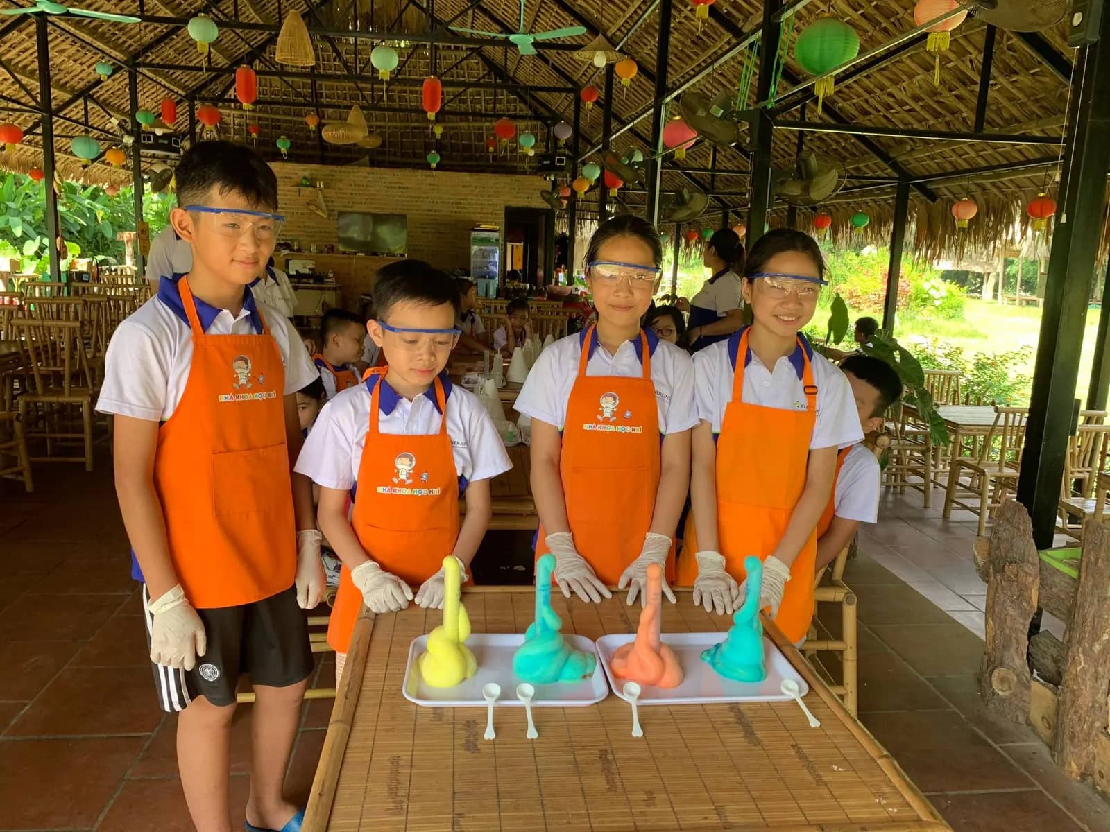 Students doing a STEM experiment at summer camp